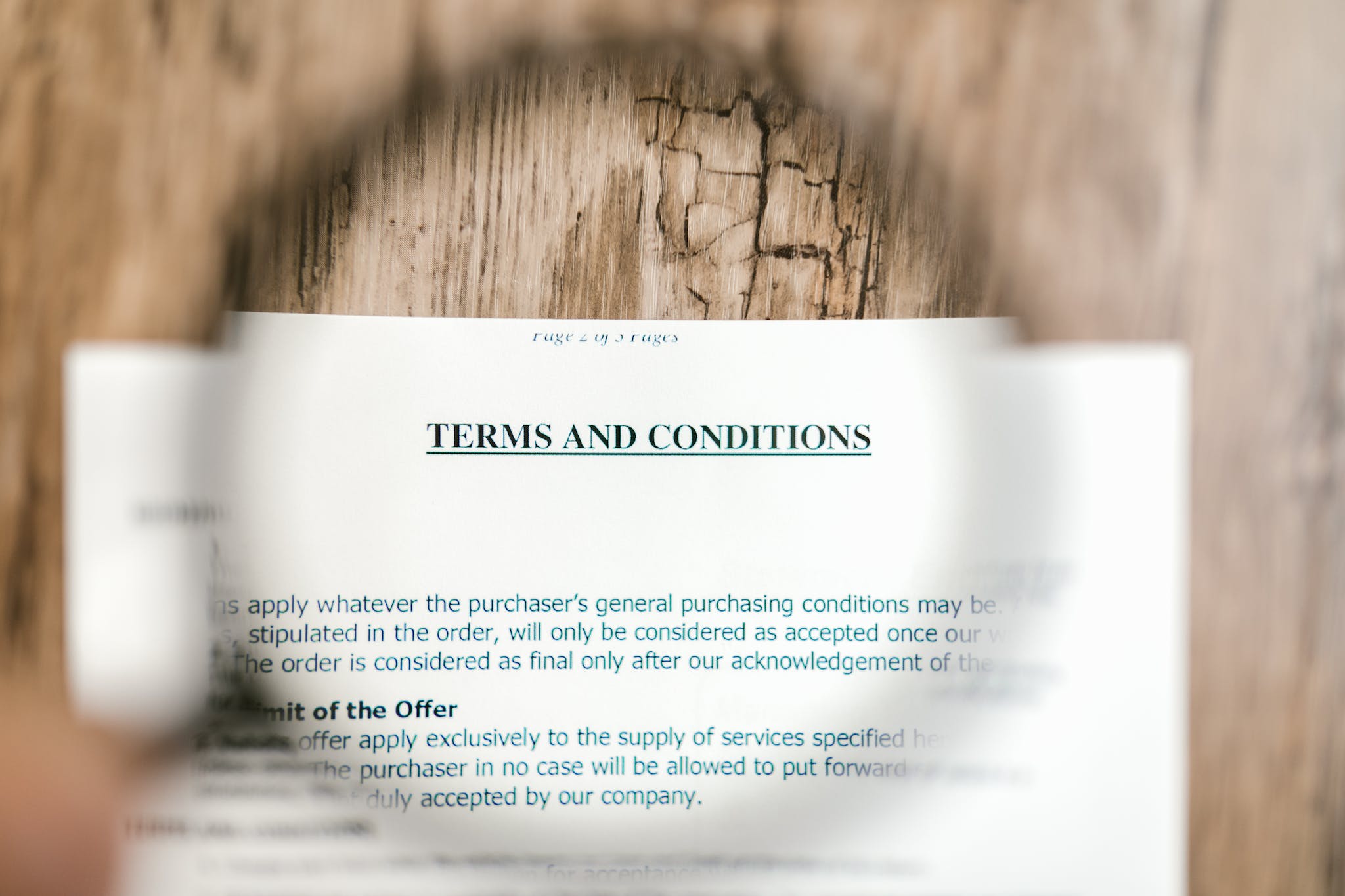 Selective Focus Photo of Terms and Conditions Written on a Paper